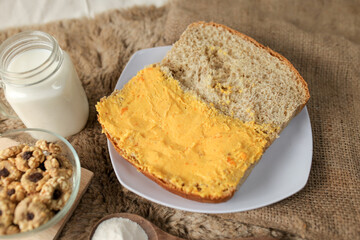 Bread with salted egg spread on a plate for healthy breakfast	

