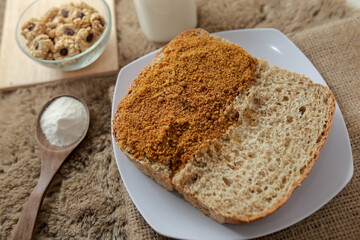 Bread with chicken floss on a plate for breakfast. Homemade bread with dried shredded chicken