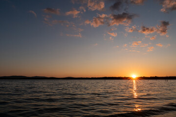 Fototapeta premium Sunset with its blue and orange colors at the Valparaíso Reservoir, Zamora, Castilla y León, Spain.