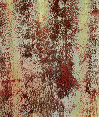 Backdrop of rusty surface of dark, brown, and orange hues. Detailed panorama grunge rusted metal texture. Close-up of rust patterns, aged iron, scratched, worn, distressed areas, corrosion details