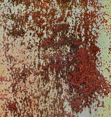 Backdrop of rusty surface of dark, brown, and orange hues. Detailed panorama grunge rusted metal texture. Close-up of rust patterns, aged iron, scratched, worn, distressed areas, corrosion details