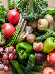 Seasonal vegetables and fruits in close-up, top view. Food background