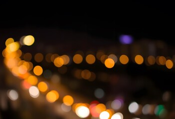 Blurred city lights at night  with colorful bokeh effect