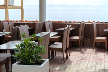 Tables and chairs in a street cafe