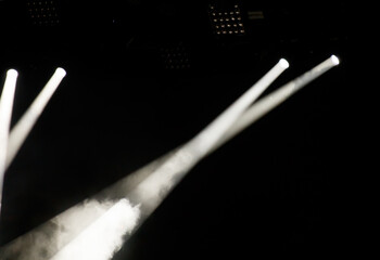 Light from spotlights on stage. Background