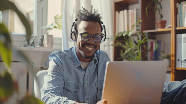 The smiling man with laptop