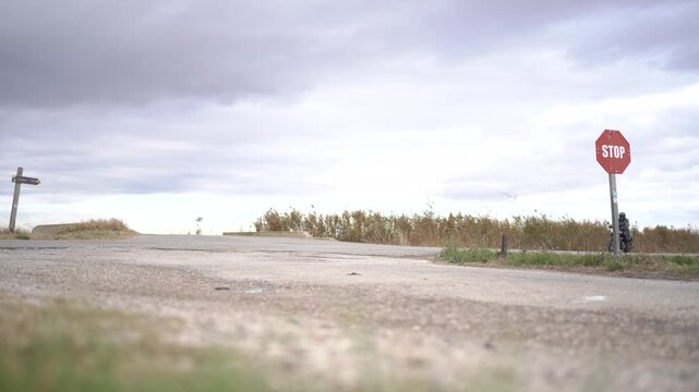Motorcycle rider in a lonely road