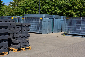 Temporary fencing. Security. Mass event. A large crowd of people. Portable sectional fence. Steel...