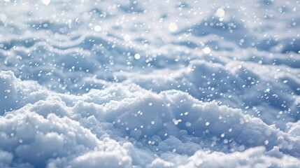 Obraz premium Snowflakes gently falling on a soft, snow-covered area.