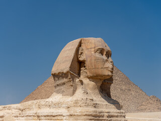 The great Sphinx of Giza sculpted in limestone rock in El Cairo Egypt