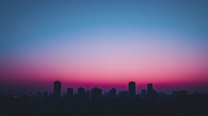 Fototapeta premium Glowing silhouettes of skyscrapers against a colorful sunset highlighting the beauty of modern architecture