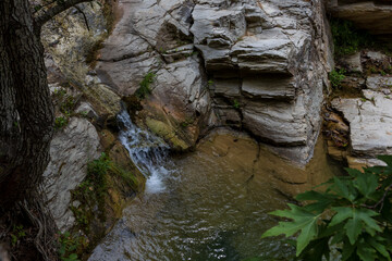 Fototapeta premium Fresh water lake Maries on the island of Thassos Greece - flowing water from the mountains - waterfalls