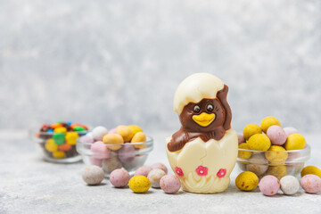 Easter Chocolate Chick. Easter celebration concept. Happy Easter. Chocolate sweet eggs. Candies on...