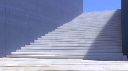   A blue sky backgrounds white stairs up a building