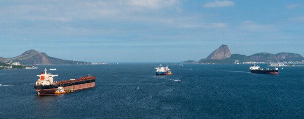 Cargo Ships in Guanabara Bay in Rio de Janeiro Skyline - Christ the Redeemer Statue in the background