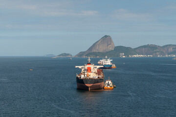 Cargo Ships in Guanabara Bay in Rio de Janeiro Skyline - Christ the Redeemer Statue in the background
