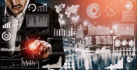 Big Data Technology for Business Finance Analytic Concept. Modern interface shows massive information of business sale report, profit chart and stock market trends analysis on screen monitor. uds
