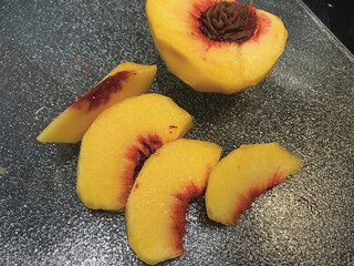 Peach Slices and Half A Peach