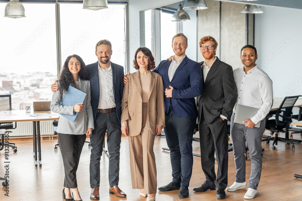 Poster a group of six diverse business professionals stand together in a modern office setting. they are al