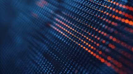 Obraz premium Abstract digital background with glowing dots, creating a mesmerizing pattern in blue and orange tones. Ideal for technology themes.