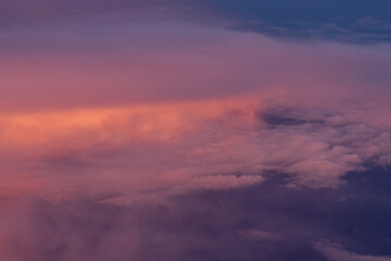 An aerial view of sunset clouds over the southeastern United States out my airplane window
