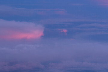 An aerial view of sunset clouds over the southeastern United States out my airplane window