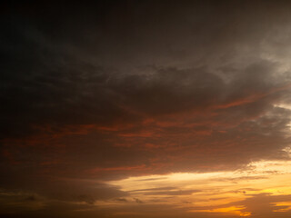 Cloudy blue dramatic sunset sky. Nature background for design and replacement. Warm and cold color tone
