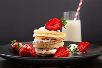 Stack Of Pancakes With Fresh Strawberries And Milkshake