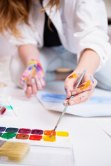 Artist Painting with Colorful Watercolors