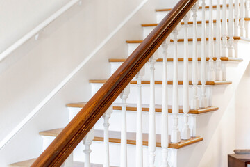 traditional white and wood stairway
