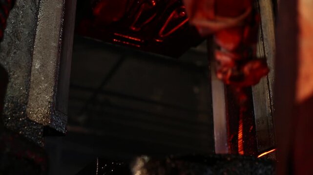 hot drop forging metal piece shaping drop hammer to give it a tool shape. Open die forging hit by hammer on a tool to form an automatic machine component, parts tools, welding forge factory. hot