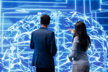 Teamworking colleagues implementing artificial intelligence parallel processing, breaking up...