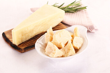 Chopped Italian hard parmesan cheese