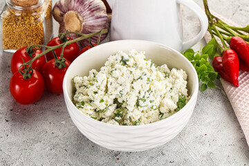 Curd cheese with green herbs