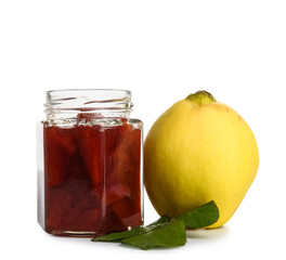 Quince fruit with jar of jam on white background