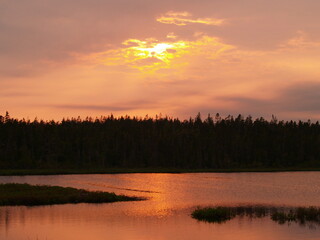 A beautiful red sunset over a lake