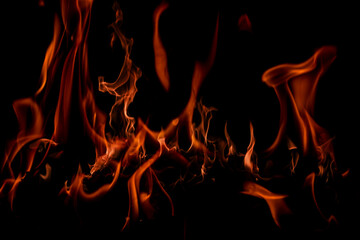 Texture of fire on black background. Hell bonfire. Texture of fire on a black background. Fire over...