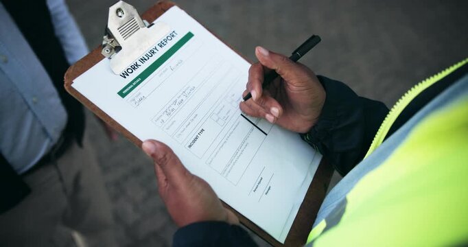 Hands, construction site and men with clipboard, writing and injury report with feedback. Inspection, employee and consultant with documents, compliance and risk management with paperwork for policy