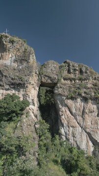 Vertical drone video. Rock formations, forested mountains and large formations. Hiking through the green forest. Hiking concept. Amatlan, Mexico