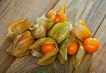 Physalis peruviana yellow, edible physalis species. Vegetarian dish. Healthy life experience