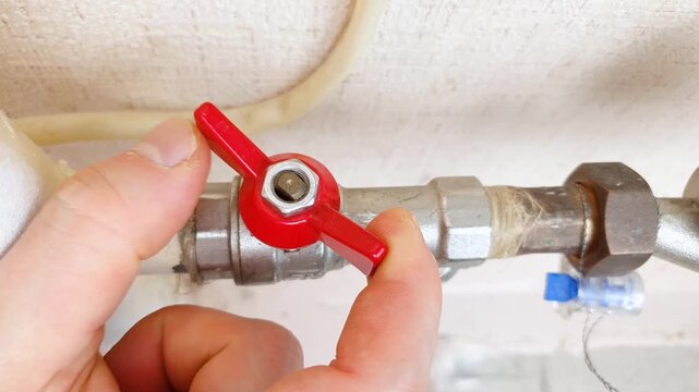 Close, open valve, valve on water supply pipe. Water shutoff. Sanitary valve for water supply.