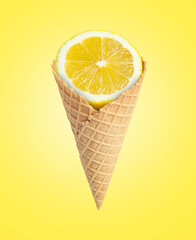 Ice cream cone with lemon on yellow background