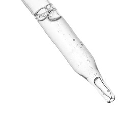 Dropper with clear cosmetic oil on white background