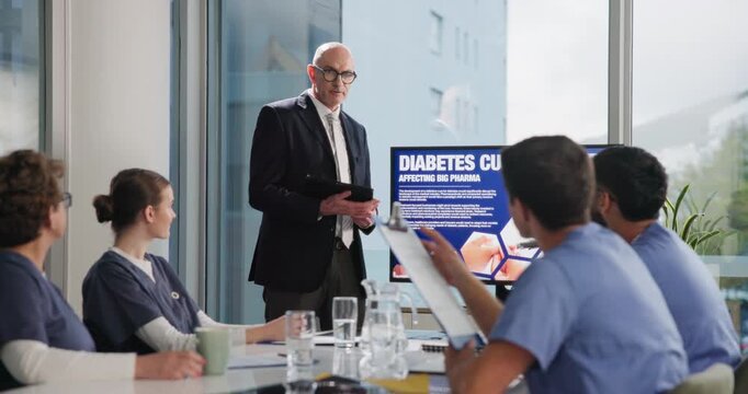 Business people, man and screen in office for presentation on diabetes cure, impact and affecting pharmacy. Meeting, discussion and conversation for medication sales, profit and market dynamic.