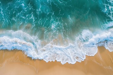 Obraz premium Aerial view of sandy beach and ocean nature with waves. Beach and waves from top view. 