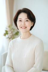 Elegant Middle-aged Woman with a Warm Smile in a Cozy Home Environment