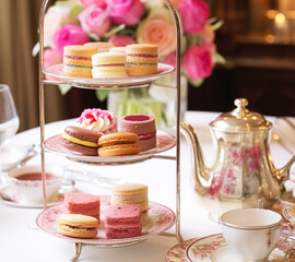 Afternoon tea, English tradition and restaurant service, tea cups, cakes, scones, sanwiches and desserts, holiday table decor and afternoon tea stand with pink flowers, post-processed, generative ai