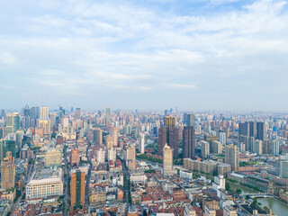 Fototapeta premium Aerial view of modern city skyline and buildings at sunrise in Shanghai