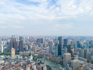 Aerial view of modern city skyline and buildings at sunrise in Shanghai