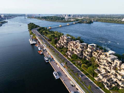 The sunset view of apartment Habitat 67 near to St. Lawrence River, Montreal, Canada. Drone view.